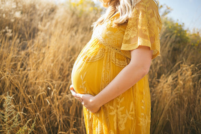 Pregnant woman considering DHA supplements for prenatal nutrition